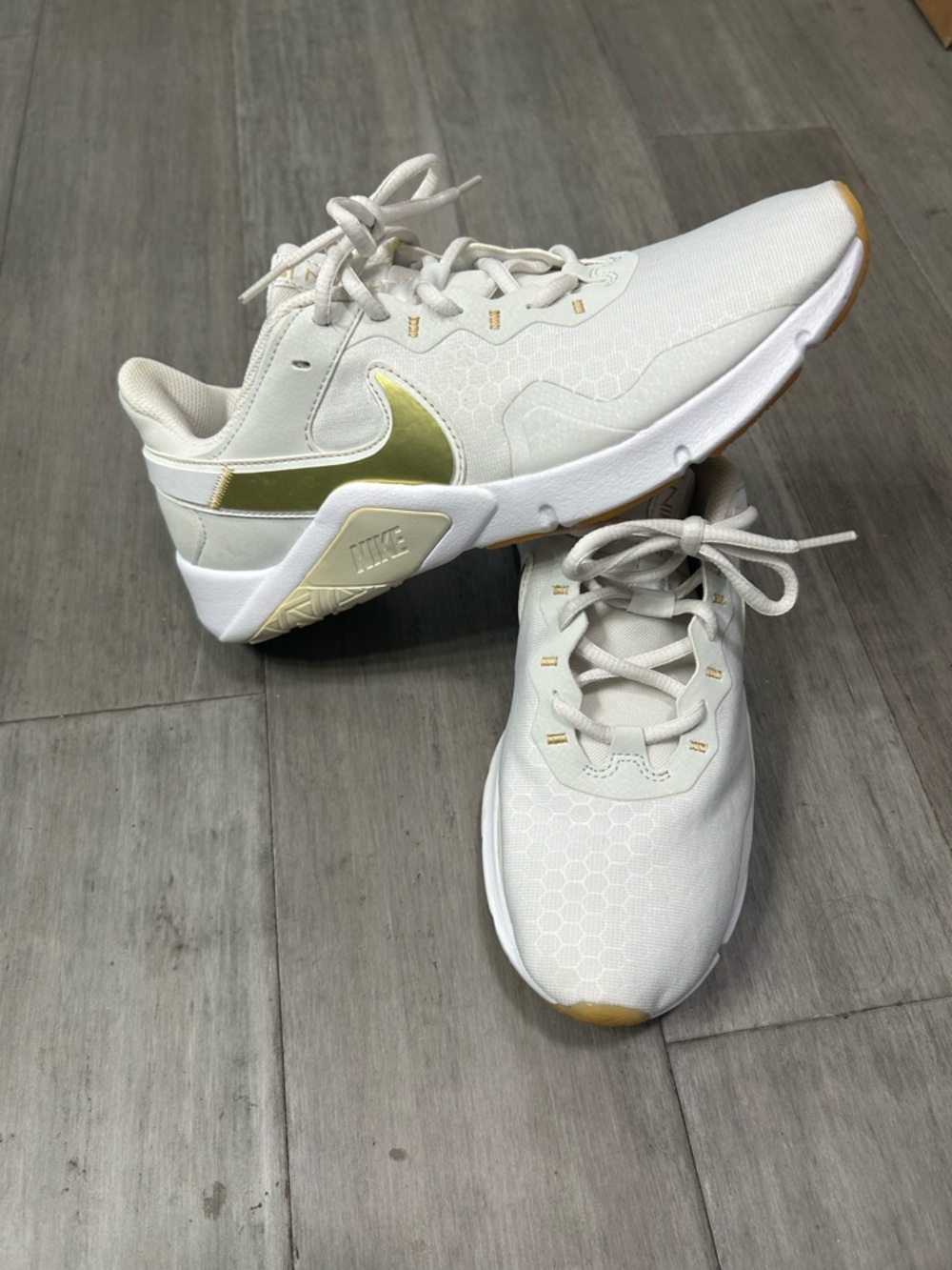 Nike White and Gold Trainer Legend Essential